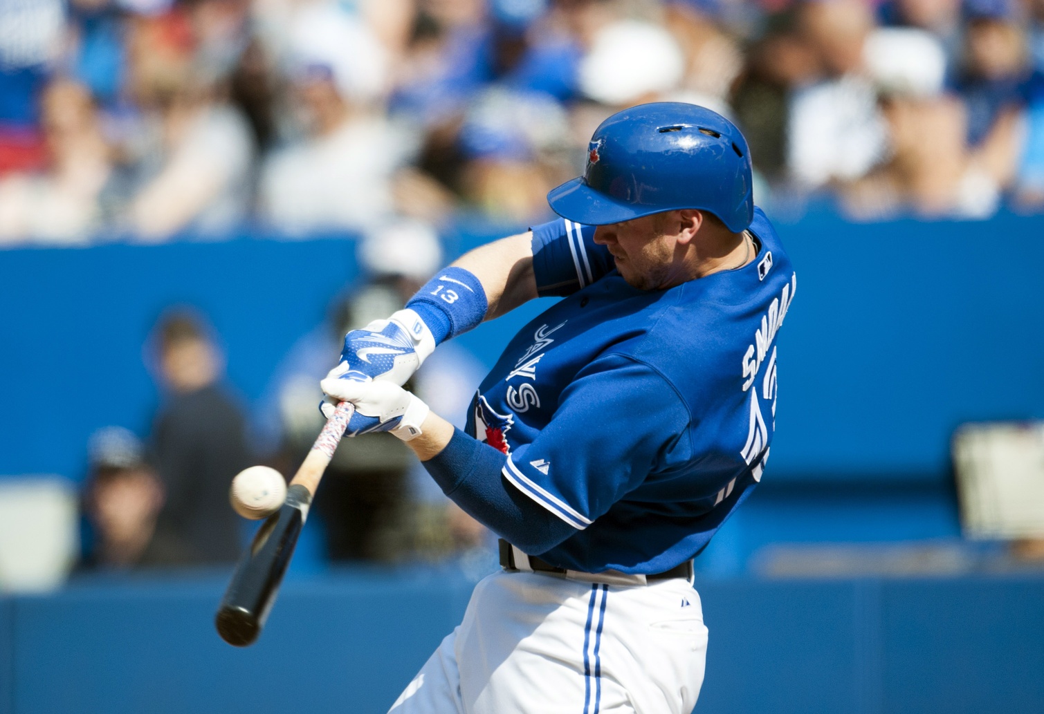 Sep 5, 2015; Toronto, Ontario, CAN; Toronto Blue Jays first baseman Justin Smoak (13) bats against Baltimore Orioles during the sixth inning at Rogers Centre. Jays beat Orioles 5 - 1. Mandatory Credit: Peter Llewellyn-USA TODAY Sports